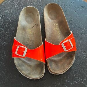 Neon orange patent Birkenstock
